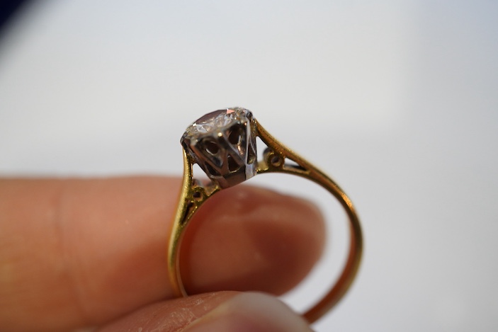 A diamond solitaire ring